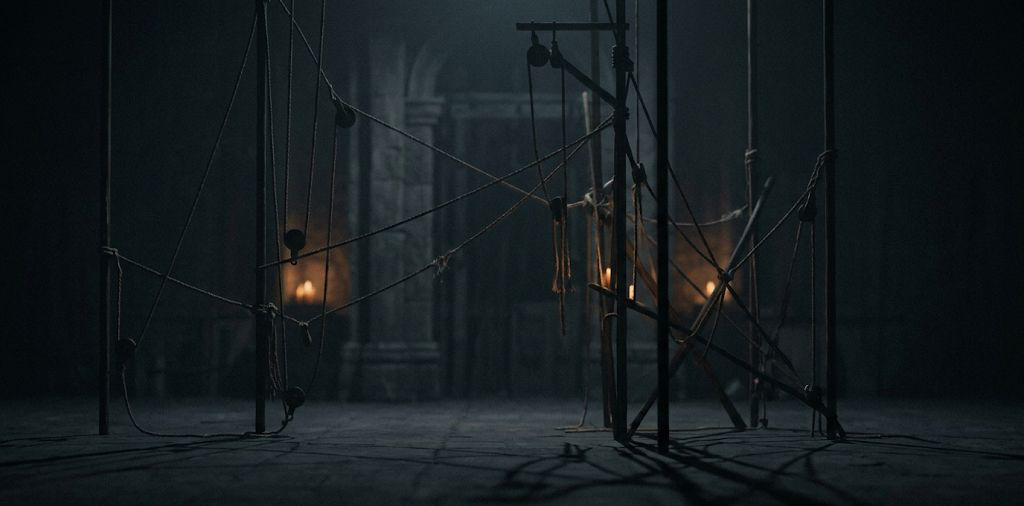 A man stands in a dimly lit elevator with closed doors. A subtle orange glow highlights muted gray walls, creating a mysterious atmosphere.
